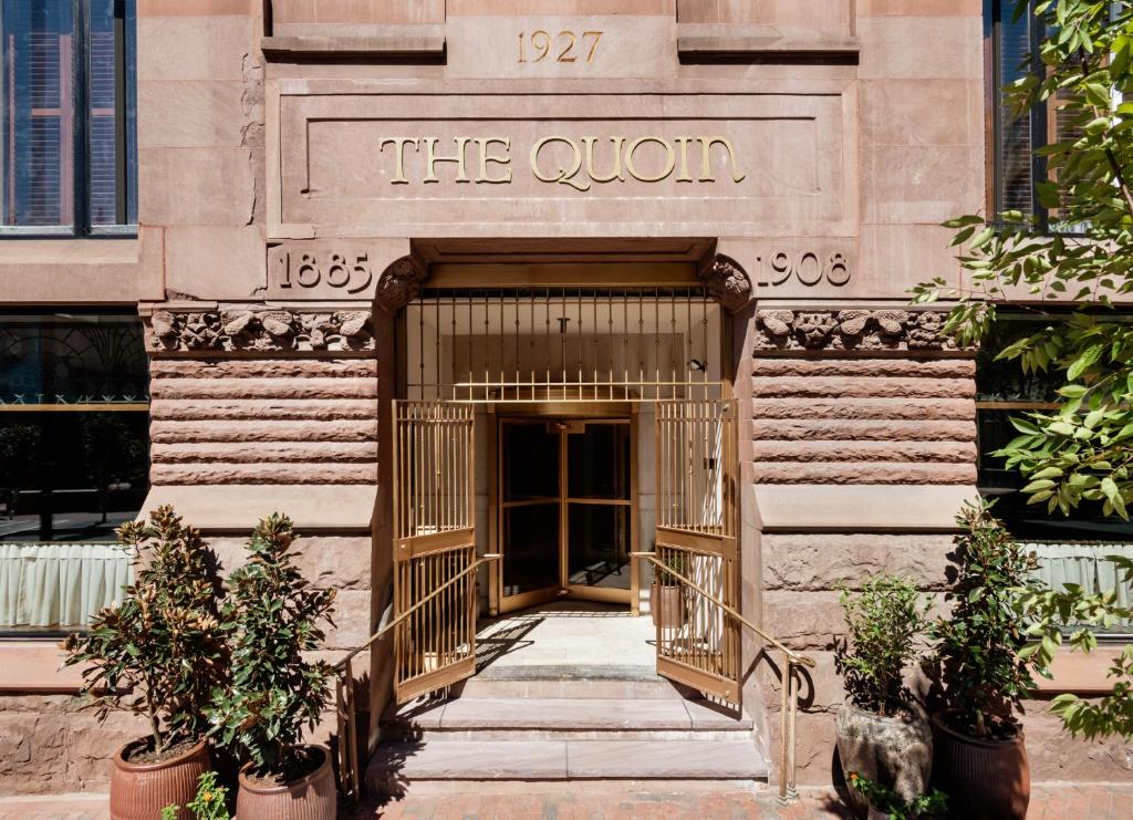 an entrance to a building with the qurn sign on it at The Quoin Hotel in Wilmington