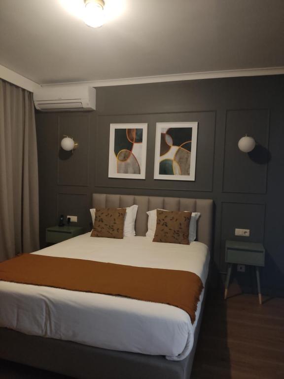 Postel nebo postele na pokoji v ubytování Hotel Rural Solar das Arcadas