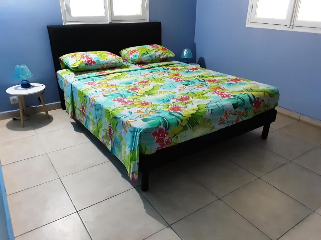 Postel nebo postele na pokoji v ubytování Ti Kaz en Nou'