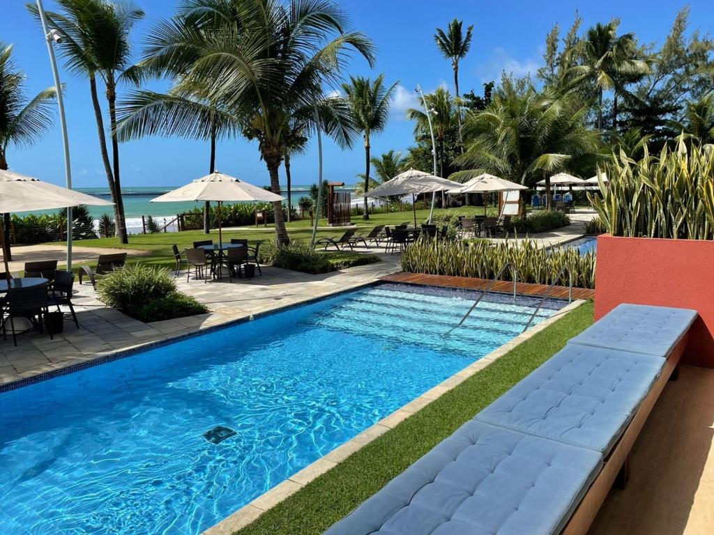 a pool at the resort at Paraíso a Beira Mar de Porto de Galinhas in Porto De Galinhas