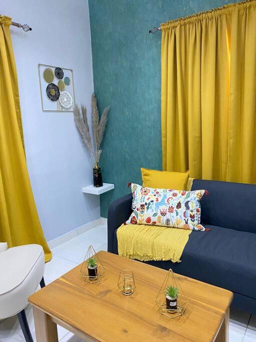 Posezení v ubytování Apartamentos Melya cerca de la Playa Caleta