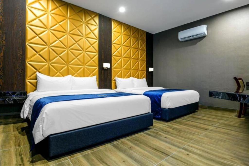 Postel nebo postele na pokoji v ubytování U3 HOTEL
