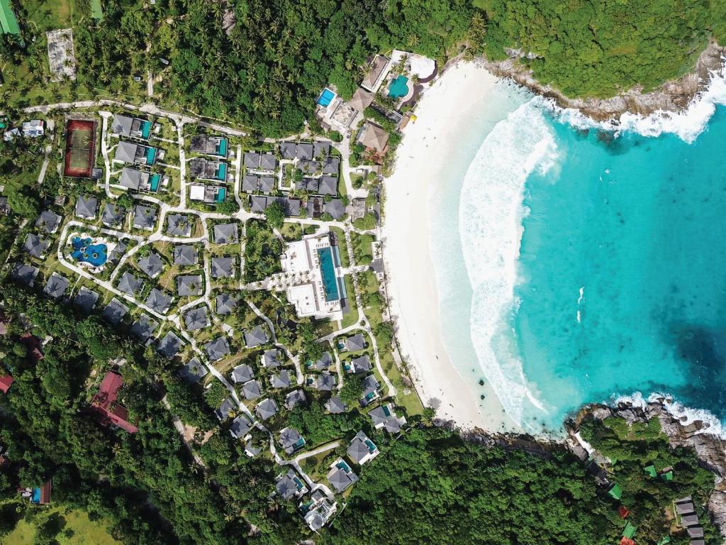 an aerial view of a resort next to a beach at The Racha in Ko Racha Yai 