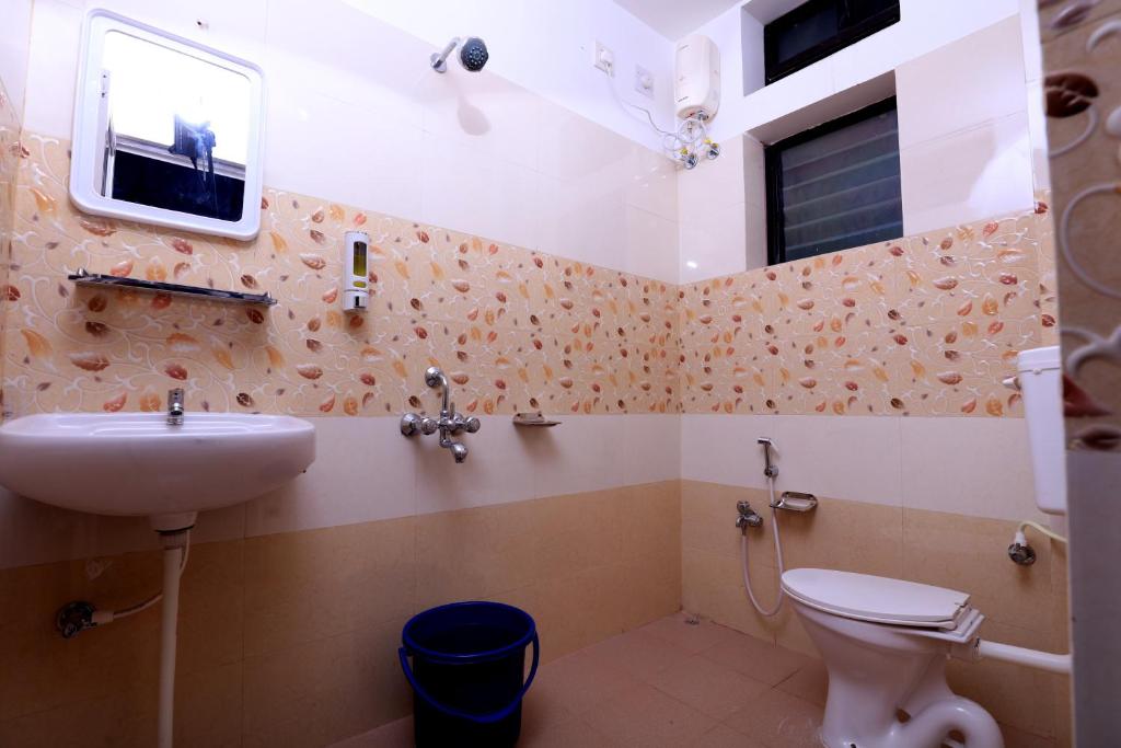 Koupelna v ubytování Railview inn Bhubaneswar