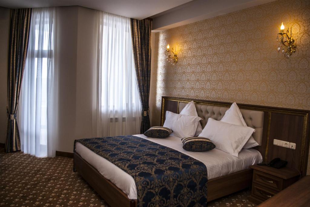 Postel nebo postele na pokoji v ubytování Multi Rest House