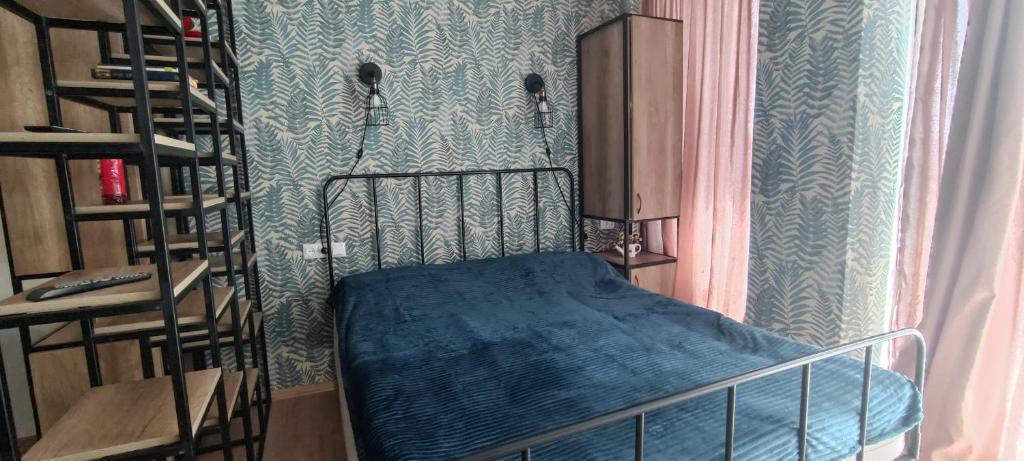 เตียงในห้องที่ Appartment in Bakuriani