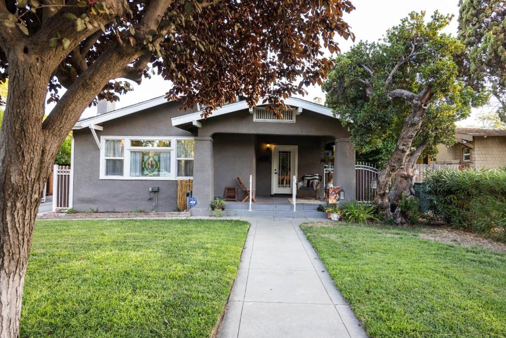 a house with a sidewalk leading to the front door at 738 E Yale in Fresno