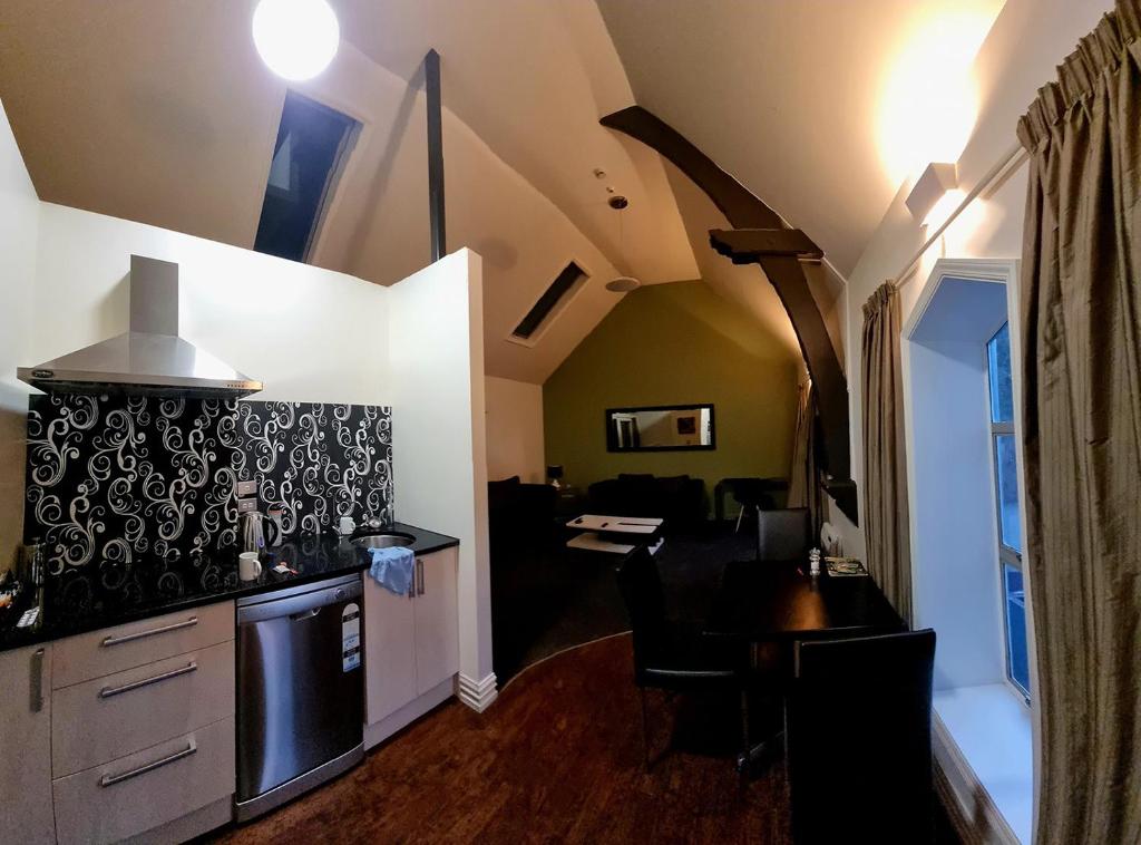 Kuchyň nebo kuchyňský kout v ubytování Chapel Apartments