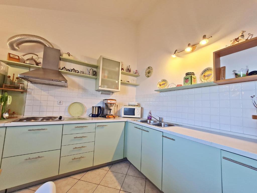 Kuchyňa alebo kuchynka v ubytovaní Apartment Ivana Borak
