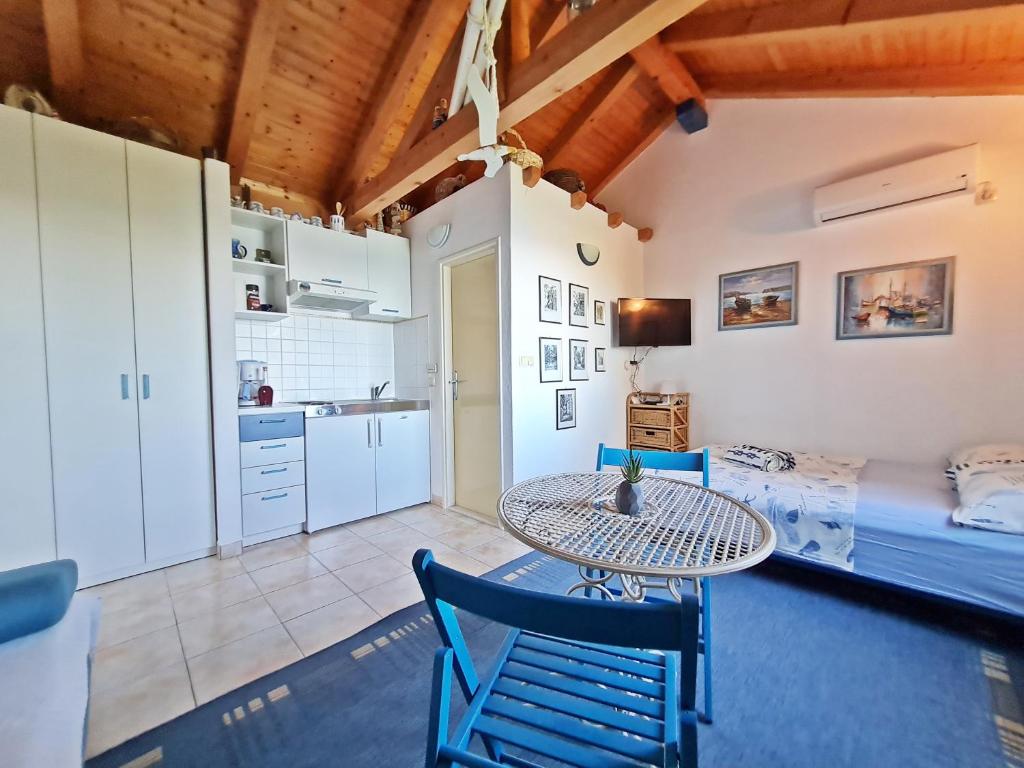 Kuchyňa alebo kuchynka v ubytovaní Apartment Ivana Borak