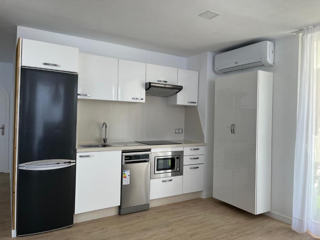 Kuchyň nebo kuchyňský kout v ubytování Luxury Sunset Ocean View