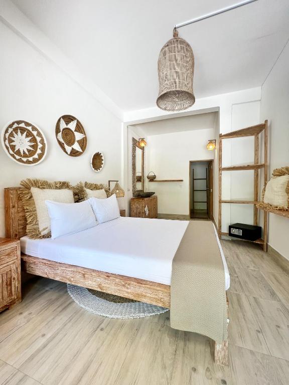Postel nebo postele na pokoji v ubytování Iru Maldives