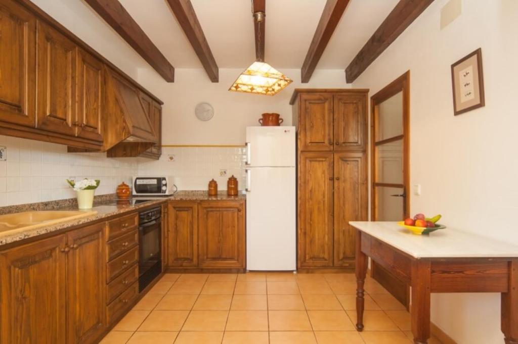 Kuchyň nebo kuchyňský kout v ubytování Villa Tia