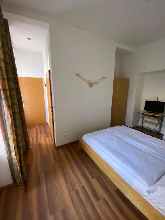 Postel nebo postele na pokoji v ubytování Kolbeck Rooms