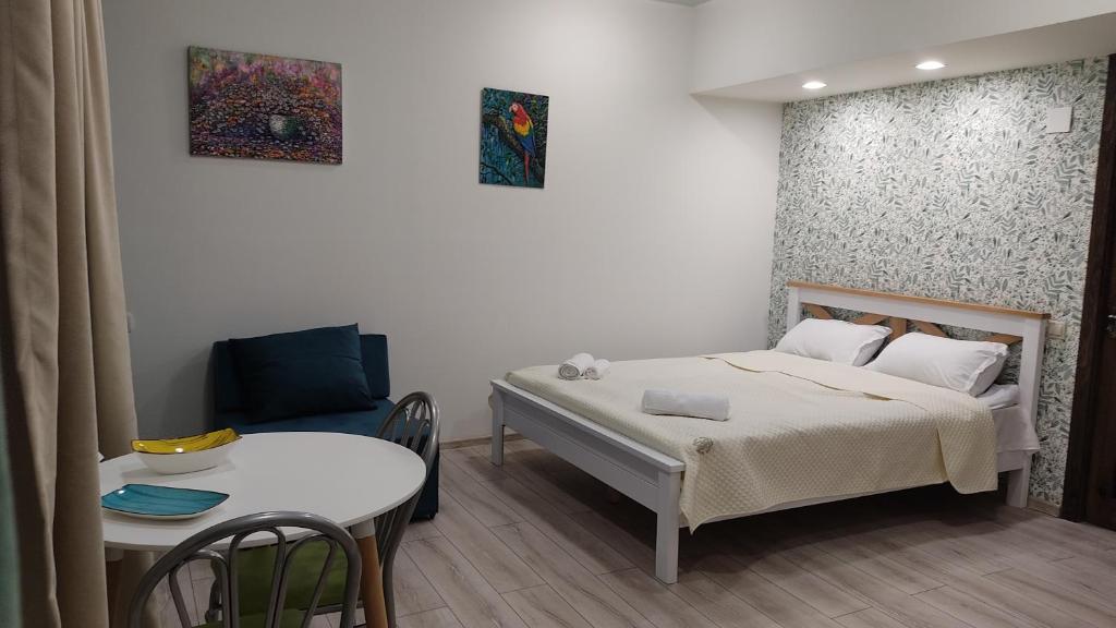 Postel nebo postele na pokoji v ubytování Borjomi Nest 1