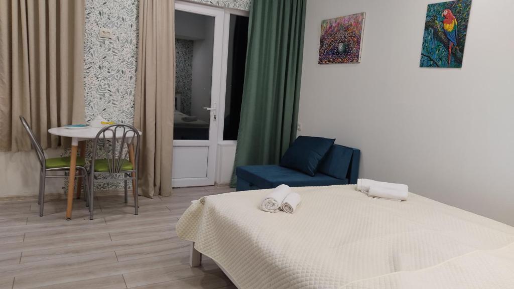 Postel nebo postele na pokoji v ubytování Borjomi Nest 1