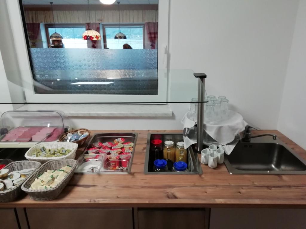 Kuchyň nebo kuchyňský kout v ubytování Hotel-Garni Seestrand