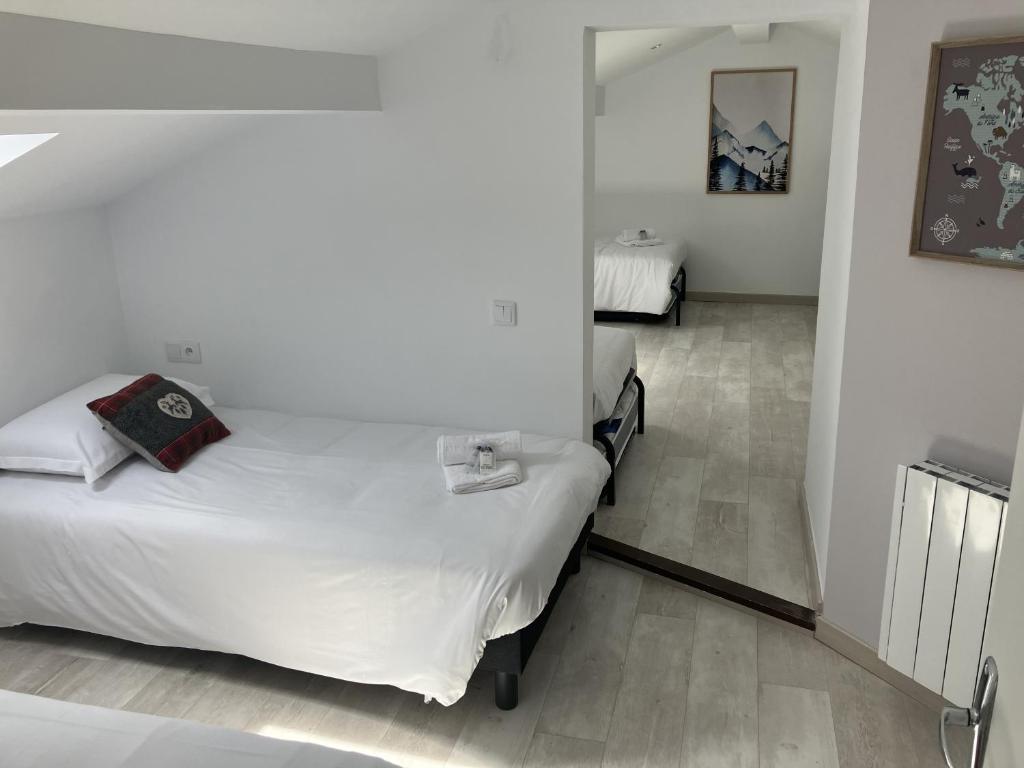 Postel nebo postele na pokoji v ubytování Les lofts M