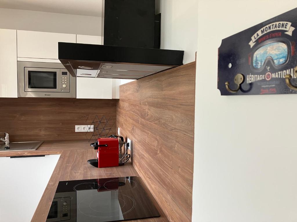 Kuchyň nebo kuchyňský kout v ubytování Les lofts M