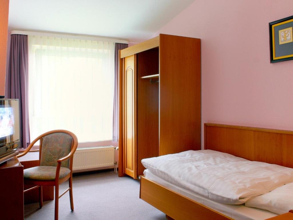 Postel nebo postele na pokoji v ubytování Kärntner Stub'n