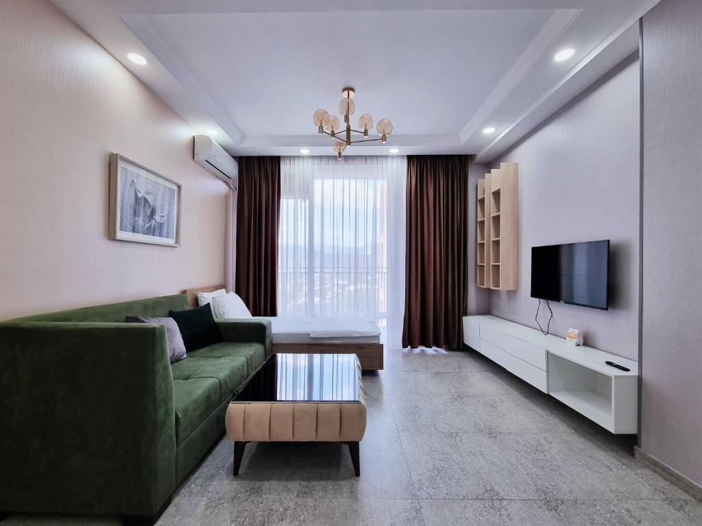 TV a/nebo společenská místnost v ubytování MD Apart Hotel Tbilisi