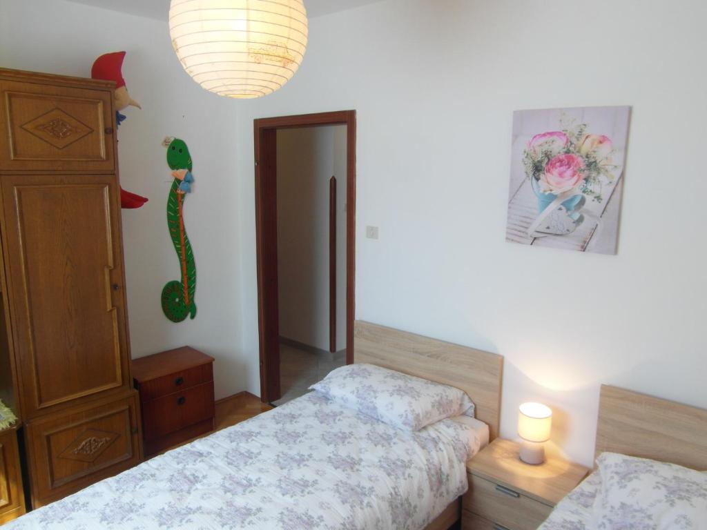 Posteľ alebo postele v izbe v ubytovaní Apartments Ida, 100 m from the beach