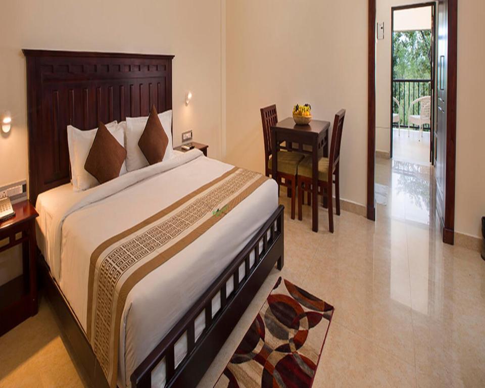 Coorg Cliffs Resortsにあるベッド