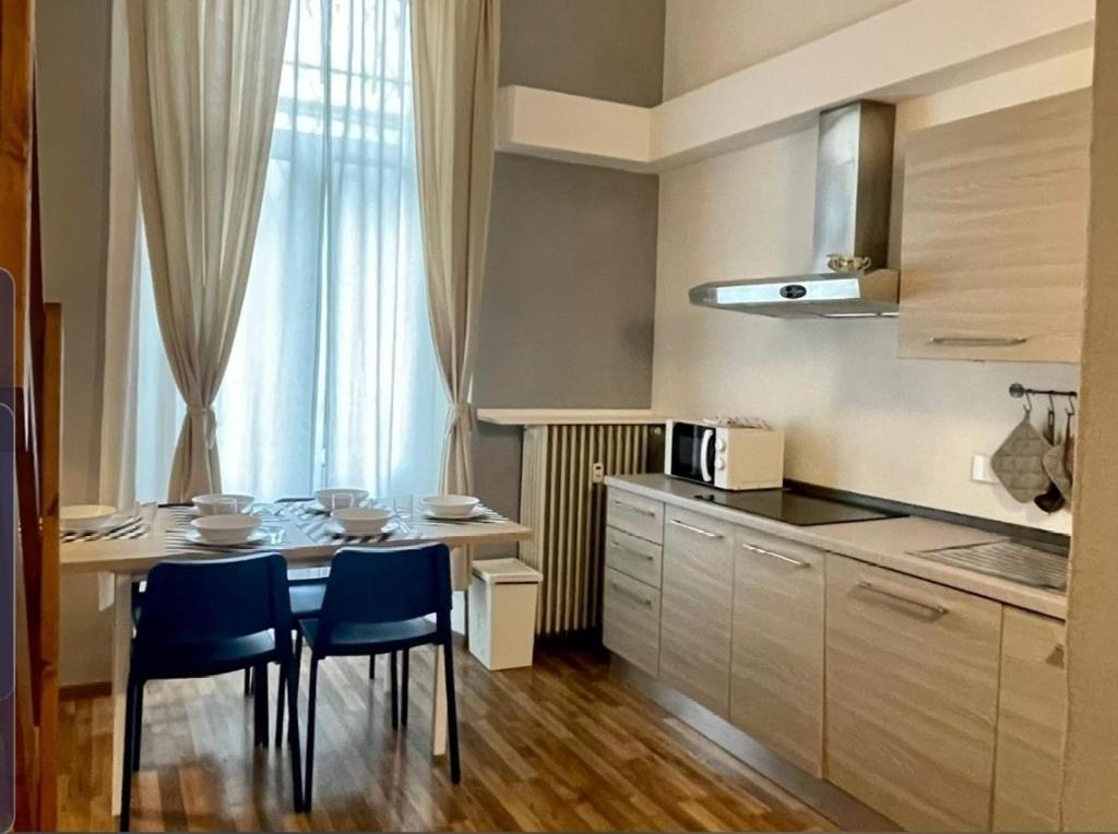Kuchyň nebo kuchyňský kout v ubytování Casa Marsili - Luxury Apartment