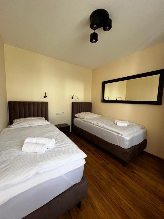 Postel nebo postele na pokoji v ubytování Apartments Wile Süd
