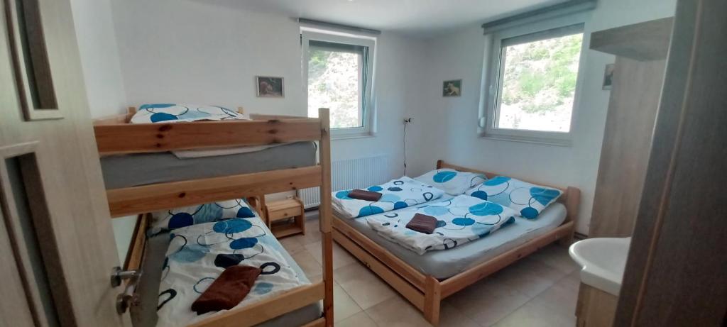 Postel nebo postele na pokoji v ubytování Chata U dědka
