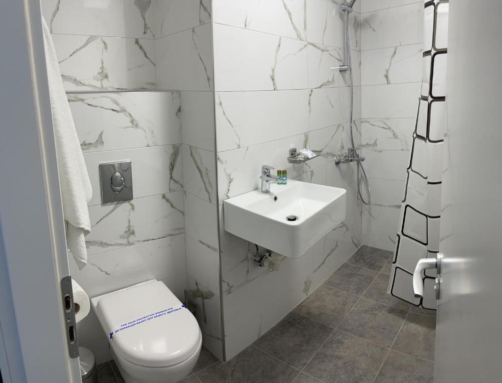 Koupelna v ubytování Hotel Rotasar