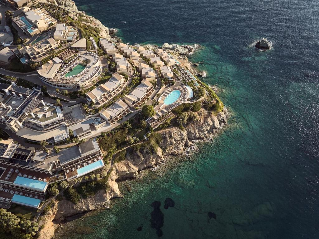 an aerial view of a resort near the water at Seaside A Lifestyle Resort - Adults Only in Agia Pelagia