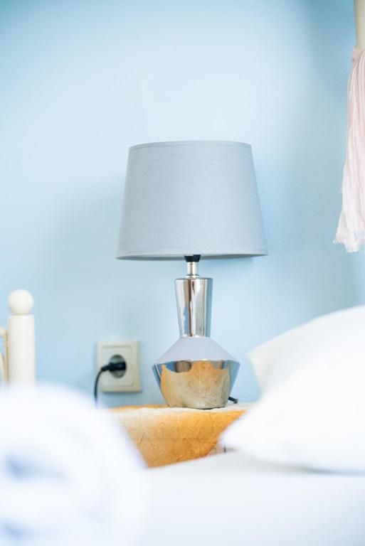 Postel nebo postele na pokoji v ubytování Manos Rooms