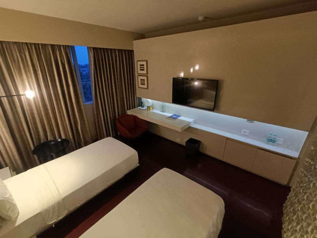 Postel nebo postele na pokoji v ubytování Boulevard by Design Hotel Chennai