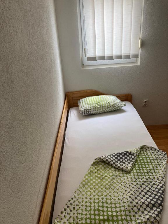 Postel nebo postele na pokoji v ubytování Quite beautiful apartment in the Split Neda with 4bedrooms