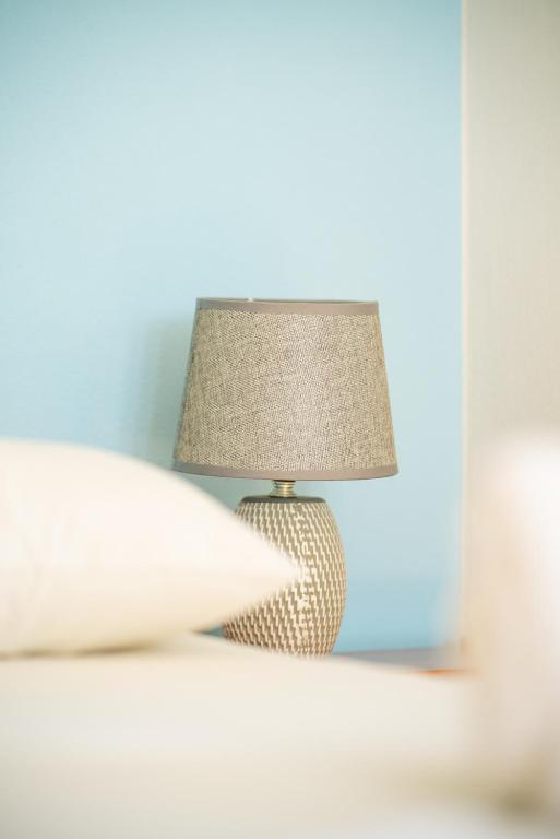 Postel nebo postele na pokoji v ubytování Manos Rooms
