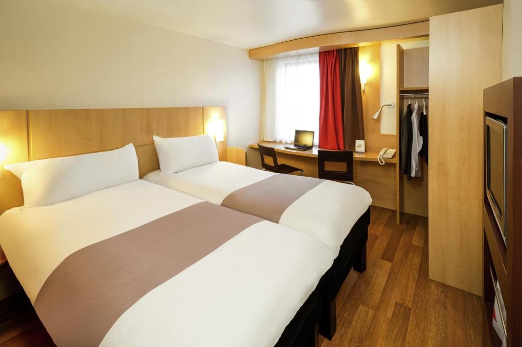 Postel nebo postele na pokoji v ubytování ibis Hotel Brussels Airport