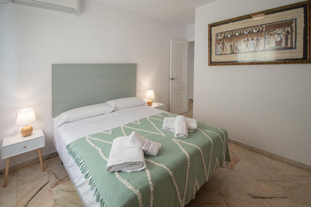 Posteľ alebo postele v izbe v ubytovaní Apartamento Tribalia Cadiz