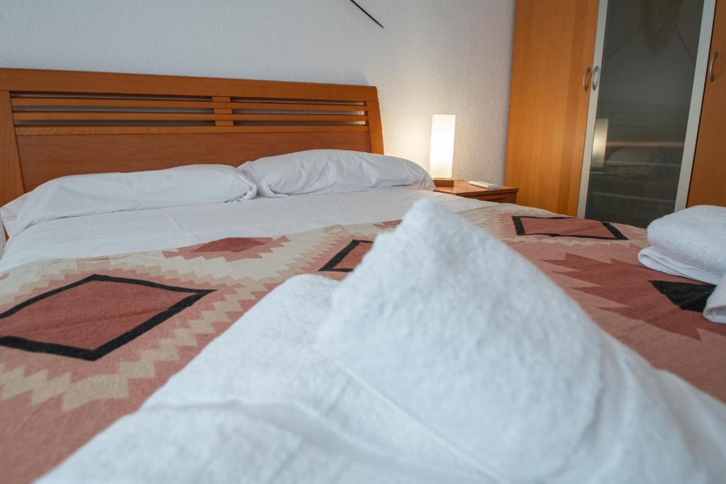 Posteľ alebo postele v izbe v ubytovaní Apartamento Tribalia Cadiz