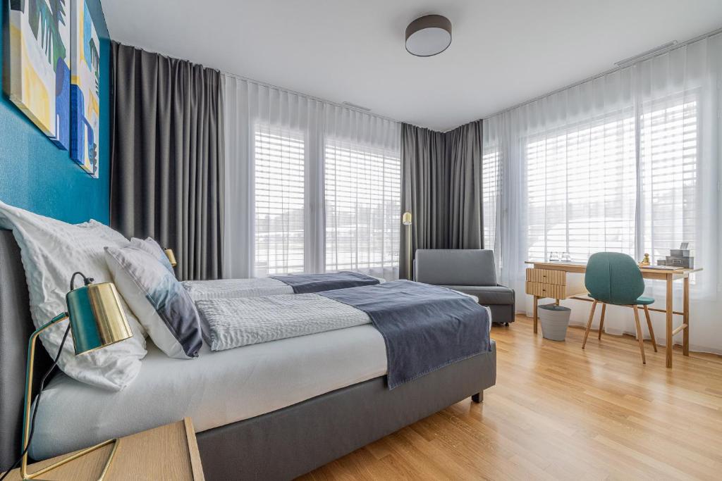 Postel nebo postele na pokoji v ubytování Ambrosia Guesthouse