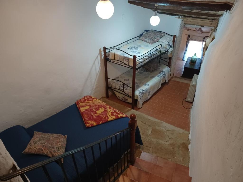 Postel nebo postele na pokoji v ubytování Casa Leonor