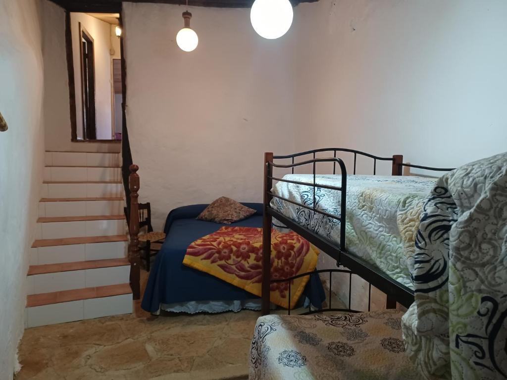 Postel nebo postele na pokoji v ubytování Casa Leonor
