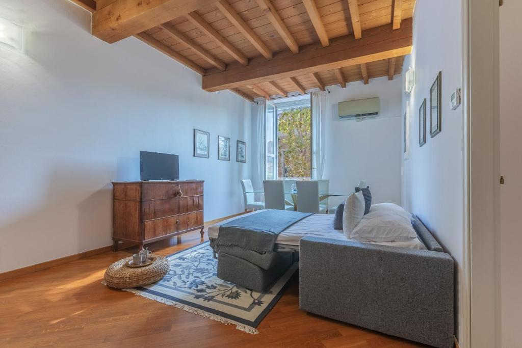Posteľ alebo postele v izbe v ubytovaní Palazzo Manfredini Exclusive & Deluxe Apartment