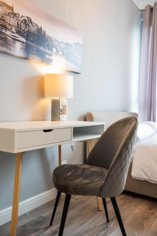 Posteľ alebo postele v izbe v ubytovaní Prestige Verdant Apartment