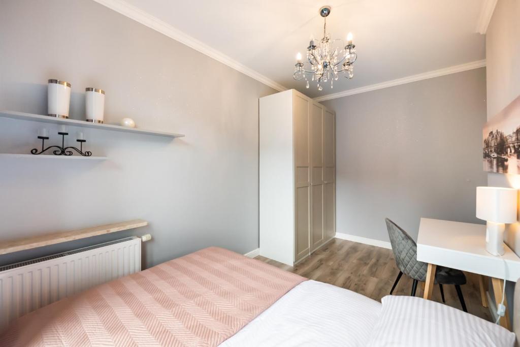 Posteľ alebo postele v izbe v ubytovaní Prestige Verdant Apartment