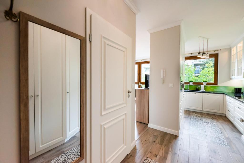 Kuchyňa alebo kuchynka v ubytovaní Prestige Verdant Apartment