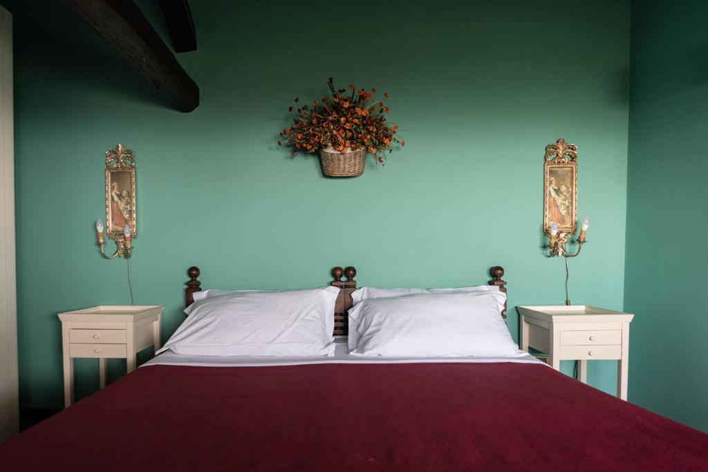 Łóżko lub łóżka w pokoju w obiekcie Hotel Villa Dorata