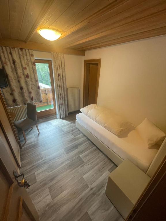 Postel nebo postele na pokoji v ubytování Hotel Edi