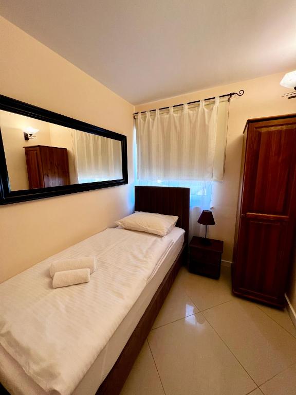 Postel nebo postele na pokoji v ubytování Apartments Wile Süd