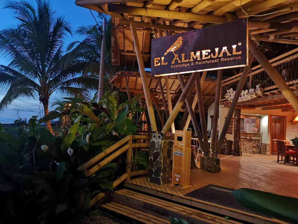 a restaurant with a sign on the side of a building at El Almejal in El Valle